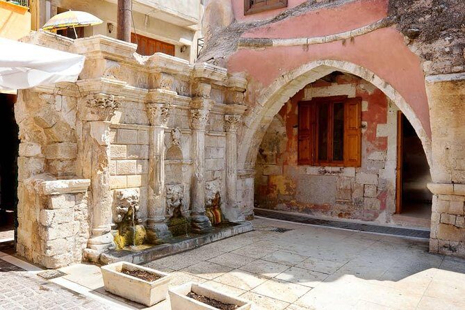 From Heraklion : Full-Day Bus Trip to Chania city , Kournas lake & Rethymno city - Stop 1: Chania Lighthouse and Old Town Harbor Views