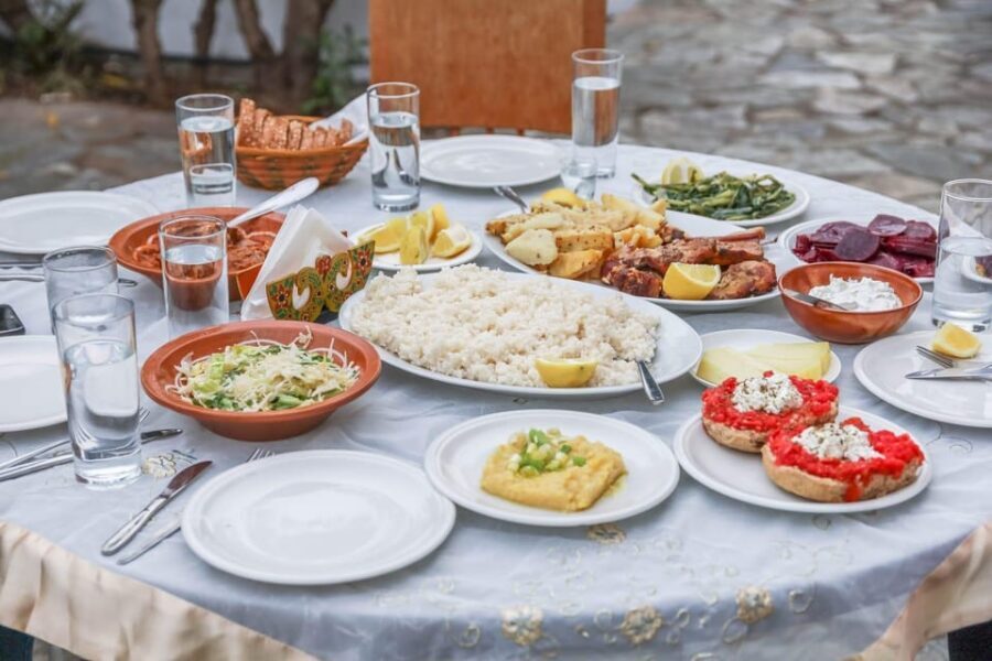 Heraklion City: Greek Food Tasting Walking Tour - The Main Dish Stop: Dakos, Moussaka, and Kalitsounia With Wine