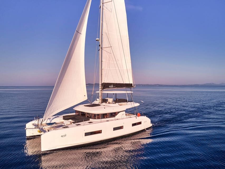 Heraklion: Dia Island Luxury Catamaran Cruise with Meal - Leaving the port: safety briefing, music, and a first sea look