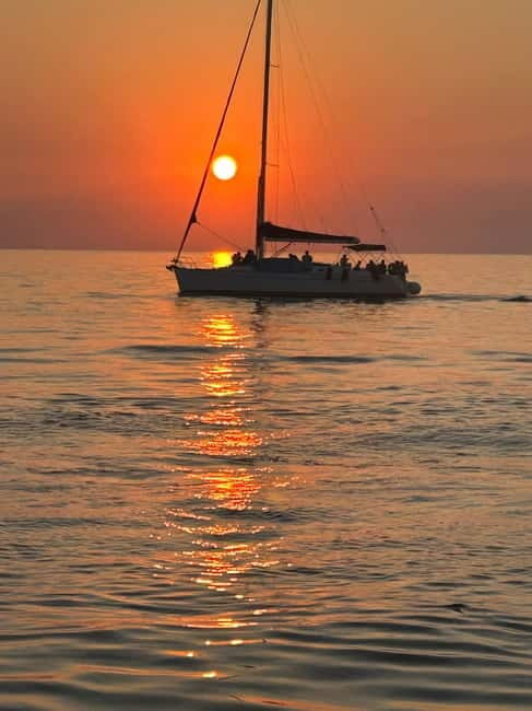 Heraklion: Dia Island Sunset Boat Tour with Dinner - Getting to the Boat: Old Anchor and Crew Meet-Up