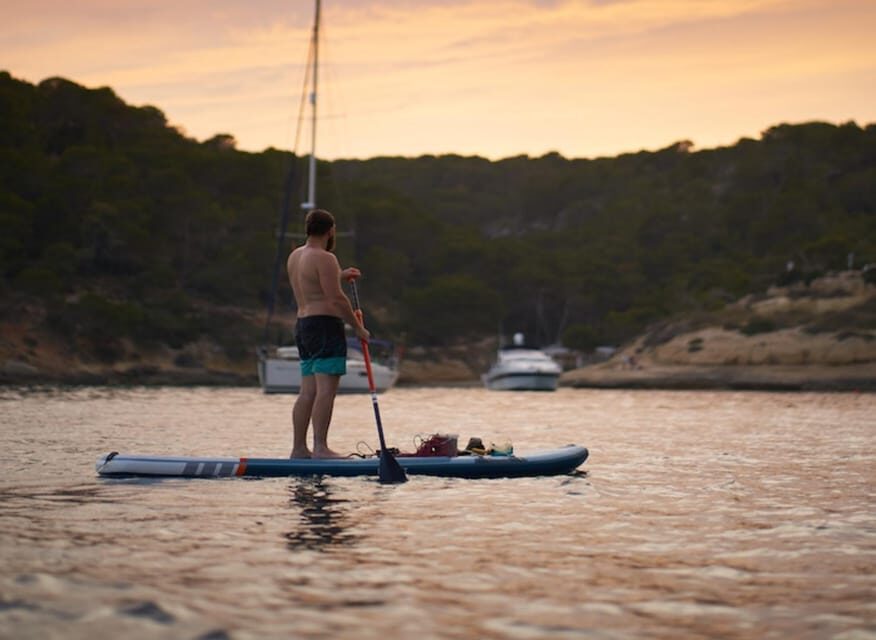 SUP Safari - Catamaran Cruise Dia Island & Gourmet Delights! - Relaxing on the catamaran after you’ve worked up an appetite